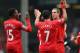 LIVERPOOL, ENGLAND - MARCH 30: Jordan Henderson of Liverpool celebrates with his team-mates Daniel Sturridge (L) and Luis Suarez after scoring the fourth goal during the Barclays Premier League match between Liverpool and Tottenham Hotspur at Anfield on