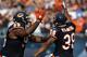 CHICAGO - OCTOBER 24: Danieal Manning #38 and Anthony Adams #95 of the Chicago Bears celebrate Mannings' interception against the Washington Redskins at Soldier Field on October 24, 2010 in Chicago, Illinois. The Redskins defeated the Bears 17-14. (Photo
