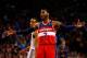 BOSTON, MA - APRIL 16: John Wall #2 of the Washington Wizards talks to his teammates against the Boston Celtics in the second half during the game at TD Garden on April 16, 2014 in Boston, Massachusetts. NOTE TO USER: User expressly acknowledges and agre