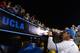 PASADENA, CA - AUGUST 31: Head coach Jim Mora of the UCLA Bruins waves to fans as he exits the field after a 58-20 win over the Nevada Wolf Pack at Rose Bowl on August 31, 2013 in Pasadena, California. (Photo by Harry How/Getty Images)