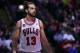 Apr 14, 2014; Chicago, IL, USA; Chicago Bulls center Joakim Noah (13) reacts to a jump ball during the second quarter of a game against the Orlando Magic at the United Center. Mandatory Credit: Mike DiNovo-USA TODAY Sports