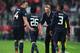 MUNICH, GERMANY - APRIL 09: David Moyes, manager of Manchester United talks to Phil Jones and Shinji Kagawa of Manchester United after the goal scored by Patrice Evra during the UEFA Champions League Quarter Final second leg match between FC Bayern Muench