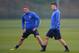 ST ALBANS, ENGLAND - MARCH 10: Mesut Ozil and Lukas Podolski look on during the Arsenal training session at London Colney on March 10, 2014 in St Albans, England. (Photo by Michael Regan/Getty Images)