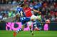 LONDON, ENGLAND - APRIL 12: James McArthur of Wigan Athletic tackles Lukas Podolski of Arsenal during the FA Cup Semi-Final match between Wigan Athletic and Arsenal at Wembley Stadium on April 12, 2014 in London, England. (Photo by Shaun Botterill/Getty