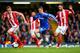 LONDON, ENGLAND - APRIL 05: Fernando Torres of Chelsea is marshalled by Ryan Shawcross of Stoke City and Marc Wilson of Stoke City during the Barclays Premier League match between Chelsea and Stoke City at Stamford Bridge on April 5, 2014 in London, Engl