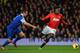 MANCHESTER, ENGLAND - DECEMBER 04: Phil Jagielka of Everton competes with Danny Welbeck of Manchester United during the Barclays Premier League match between Manchester United and Everton at Old Trafford on December 4, 2013 in Manchester, England. (Phot