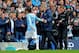 MANCHESTER, ENGLAND - APRIL 05: David Silva of Manchester City shakes hands with Manuel Pellegini the Manchester City manager as he is substituted during the Barclays Premier League match between Manchester City and Southampton at Etihad Stadium on April