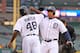 DETROIT, MI - APRIL 04: Miguel Cabrera #24 of the Detroit Tigers celebrates after hitting a two run home run for his 2,000 Major League hit during the eight inning scoring Torii Hunter #48 during the game against the Baltimore Orioles at Comerica Park on