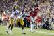BATON ROUGE, LA - NOVEMBER 17: Donte Moncrief #12 of the Ole Miss Rebels catches a touchdown pass over Jalen Mills #28 and Tharold Simon #24 of the LSU Tigers during a game at Tiger Stadium on November 17, 2012 in Baton Rouge, Louisiana. (Photo by Stacy
