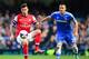 LONDON, ENGLAND - MARCH 22: Olivier Giroud of Arsenal and John Terry of Chelsea battle for the ball during the Barclays Premier League match between Chelsea and Arsenal at Stamford Bridge on March 22, 2014 in London, England. (Photo by Shaun Botterill/G