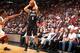 MIAMI, FL - APRIL 8: Deron Williams #8 of the Brooklyn Nets shoots the ball against the Miami Heat during on April 8, 2014 at American Airlines Arena in Miami, Florida. NOTE TO USER: User expressly acknowledges and agrees that, by downloading and or usin