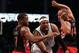 Mar 10, 2014; Brooklyn, NY, USA; Brooklyn Nets small forward Paul Pierce (34) drives to the basket between Toronto Raptors power forward Chuck Hayes (44) and point guard Kyle Lowry (7) during the fourth quarter at the Barclays Center. The Brooklyn Nets de