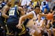DURHAM, NC - DECEMBER 03: Jabari Parker #1 of the Duke Blue Devils drives the baseline against Zak Irvin #21 of the Michigan Wolverines during play at Cameron Indoor Stadium on December 3, 2013 in Durham, North Carolina. Duke won 79-69. (Photo by Grant