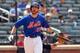 Aug 8, 2013; New York, NY, USA; New York Mets first baseman Ike Davis (29) reacts after striking out during the eighth inning of a game against the Colorado Rockies at Citi Field. Mandatory Credit: Brad Penner-USA TODAY Sports