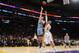 LOS ANGELES, CA - APRIL 13: Kosta Koufos #41 of the Memphis Grizzlies shoots against Robert Sacre #50 of the Los Angeles Lakers at Staples Center on April 13, 2014 in Los Angeles, California. NOTE TO USER: User expressly acknowledges and agrees that, by d