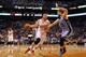 PHOENIX, AZ - APRIL 14: Miles Plumlee #22 of the Phoenix Suns drives the ball against Marc Gasol #33 of the Memphis Grizzlies during the second half of the NBA game at US Airways Center on April 14, 2014 in Phoenix, Arizona. The Grizzlies defeated the Su