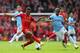 LIVERPOOL, ENGLAND - APRIL 13: Raheem Sterling of Liverpool competes with Fernandinho of Manchester City during the Barclays Premier League match between Liverpool and Manchester City at Anfield on April 13, 2014 in Liverpool, England. (Photo by Alex Li