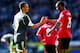 CARDIFF, WALES - APRIL 19: Peter Odemwingie of Stoke City shakes hands with Kevin Theophile-Catherine of Cardiff City after the Barclays Premier League match between Cardiff City and Stoke City at Cardiff City Stadium on April 19, 2014 in Cardiff, Wales.