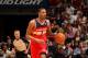 MIAMI, FL - March 10: Trevor Ariza #1 of the Washington Wizards dribbles up the court against the Miami Heat at the American Airlines Arena in Miami, Florida on March 10 2014. NOTE TO USER: User expressly acknowledges and agrees that, by downloading and/o