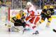 BOSTON, MA - APRIL 18: Tuukka Rask #40 of the Boston Bruins deflects the puck against Tomas Jurco #26 of the Detroit Red Wings in Game One of the First Round of the 2014 Stanley Cup Playoffs at TD Garden on April 18, 2014 in Boston, Massachusetts. (Photo