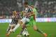 TURIN, ITALY - APRIL 19: Fernando Lorente (C) of Juventus is challenged by Mikael Antonsson (R)
of Bologna FC during the Serie A match between Juventus and Bologna FC at Juventus Arena on April 19, 2014 in Turin, Italy. (Photo by Valerio Pennicino/Getty