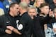 LONDON, ENGLAND - APRIL 19: Chelsea manager Jose Mourinho talks to match referee Mike Dean and the fourth official during the Barclays Premier League match between Chelsea and Sunderland at Stamford Bridge on April 19, 2014 in London, England. (Photo by