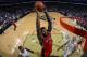 NEW ORLEANS, LA - MARCH 19: Amir Johnson #15 of the Toronto Raptors goes up for the dunk against the New Orleans Pelicans during an NBA game on March 19, 2014 at the Smoothie King Center in New Orleans, Louisiana. NOTE TO USER: User expressly acknowledges