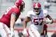 Apr 19, 2014; Tuscaloosa, AL, USA; Alabama Crimson Tide defensive lineman D.J. Pettway (57) returns an interception for a touchdown during the A-Day game at Bryant-Denny Stadium. Mandatory Credit: Marvin Gentry-USA TODAY Sports