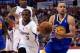 Apr 19, 2014; Los Angeles, CA, USA; Golden State Warriors guard Stephen Curry (30) drives the lane past Los Angeles Clippers guard Chris Paul (3) and center Ryan Hollins (15) in the first half in game one during the first round of the 2014 NBA Playoffs