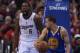 Apr 19, 2014; Los Angeles, CA, USA; Golden State Warriors guard Stephen Curry (30) looks on as Los Angeles Clippers center DeAndre Jordan (6) reacts to a dunk in the first quarter in game one during the first round of the 2014 NBA Playoffs at Staples Cent