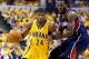 INDIANAPOLIS, IN - APRIL 19: Paul George #24 of the the Indiana Pacwrs drives to the basket against the Atlanta Hawks in Game 1 of the Eastern Conference Quarterfinals during the 2014 NBA Playoffs at Bankers Life Fieldhouse on April 19, 2014 in Indianapol
