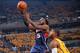 INDIANAPOLIS, IN - APRIL 19: DeMarre Carroll #5 of the Atlanta Hawks goes up for the layup against the Indiana Pacers in Game One of the Eastern Conference Quarterfinals during the 2014 NBA Playoffs on April 19, 2014 at Bankers Life Fieldhouse in Indianap