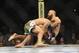 Apr 19, 2014; Orlando, FL, USA; Fabricio Werdum (red gloves) fights Travis Browne (blue gloves) in their heavyweight fight during UFC on FOX 11 at Amway Center. Mandatory Credit: David Manning-USA TODAY Sports