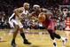 Dec 1, 2013; Miami, FL, USA; Miami Heat small forward LeBron James (6) is defended by Charlotte Bobcats shooting guard Gerald Henderson in the second half at American Airlines Arena. The Heat won 99-98. Mandatory Credit: Robert Mayer-USA TODAY Sports