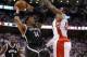 Apr 19, 2014; Toronto, Ontario, CAN; Brooklyn Nets forward Paul Pierce (34) makes a move to the basket as Toronto Raptors forward Patrick Patterson (54) defends in game one during the first round of the 2014 NBA Playoffs at Air Canada Centre. The Nets bea