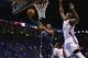OKLAHOMA CITY, OK - APRIL 19: Mike Conley #11 of the Memphis Grizzlies takes a shot against Serge Ibaka #9 of the Oklahoma City Thunder in Game One of the Western Conference Quarterfinals during the 2014 NBA Playoffs at Chesapeake Energy Arena on April 1