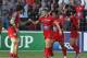 TOULON, FRANCE - APRIL 06: Drew Mitchell of Toulon is mobbed by team mates after scoring a try during the Heineken Cup quarter final match between Toulon and Leinster at the Felix Mayol Stadium on April 6, 2014 in Toulon, France. (Photo by David Rogers/