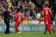 Raheem Sterling celebrates his early strike with Rodgers