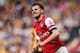 HULL, ENGLAND - APRIL 20: Aaron Ramsey of Arsenal celebrates scoring his sides first goal during the Barclays Premier League match between Hull City and Arsenal at KC Stadium on April 20, 2014 in Hull, England. (Photo by Scott Heavey/Getty Images)