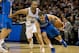 Apr 20, 2014; San Antonio, TX, USA; Dallas Mavericks guard Jose Calderon (8) drives to the basket past San Antonio Spurs guard Tony Parker (9) during the first quarter in game one during the first round of the 2014 NBA Playoffs at AT&T Center. Mandatory C