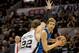 Apr 20, 2014; San Antonio, TX, USA; San Antonio Spurs center Tiago Splitter (22) guards Dallas Mavericks forward Dirk Nowitzki (41) during the first quarter in game one during the first round of the 2014 NBA Playoffs at AT&T Center. Mandatory Credit: Jero