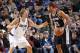 DALLAS, TX - DECEMBER 30: Tim Duncan #21 of the San Antonio Spurs looks to drive against Dirk Nowitzki #41 of the Dallas Mavericks on December 30, 2012 at the American Airlines Center in Dallas, Texas. NOTE TO USER: User expressly acknowledges and agrees