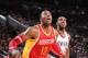 PORTLAND, OR - DECEMBER 12: Dwight Howard #12 of the Houston Rockets boxes out LaMarcus Aldridge #12 of the Portland Trail Blazers on December 12, 2013 at the Moda Center Arena in Portland, Oregon. NOTE TO USER: User expressly acknowledges and agrees tha