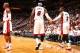 MIAMI, FL - April 20: LeBron James #6 and Dwyane Wade #3 of the Miami Heat celebrate against the Charlotte Bobcats during Game One of the Eastern Conference Quarterfinals of the 2014 NBA playoffs at the American Airlines Arena in Miami, Florida on April 2