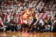 MIAMI, FL - April 20: Chris Bosh #1 of the Miami Heat handles the ball against Josh McRoberts #11 of the Charlotte Bobcats during Game One of the Eastern Conference Quarterfinals of the 2014 NBA playoffs at the American Airlines Arena in Miami, Florida on