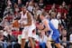 PORTLAND, OR - APRIL 13: LaMarcus Aldridge #12 of the Portland Trail Blazers handles the ball against David Lee #10 of the Golden State Warriors on April 13, 2014 at the Moda Center Arena in Portland, Oregon. NOTE TO USER: User expressly acknowledges and