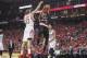 Apr 20, 2014; Houston, TX, USA; Portland Trail Blazers guard Damian Lillard (0) shoots the ball as Houston Rockets guard Francisco Garcia (32) defends during the second quarter in game one during the first round of the 2014 NBA Playoffs at Toyota Center.