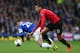 LIVERPOOL, ENGLAND - APRIL 20: Ross Barkley of Everton is fouled by Chris Smalling of Manchester United during the Barclays Premier League match between Everton and Manchester United at Goodison Park on April 20, 2014 in Liverpool, England. (Photo by Al