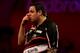 LONDON, ENGLAND - DECEMBER 30: Adrian Lewis of England reacts during his semi final match against Michael van Gerwen of The Netherlands on day fifteen of the Ladbrokes.com World Darts Championship at Alexandra Palace on December 30, 2013 in London, Englan