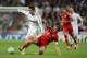 MADRID, SPAIN - APRIL 25: Philipp Lahm of Bayern Munich tackles Cristiano Ronaldo of Real Madrid during the UEFA Champions League Semi Final second leg between Real Madrid CF and Bayern Munich at The Bernabeu Stadium on April 25, 2012 in Madrid, Spain.